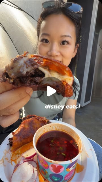 Evelyn trying a favorite Disneyland taco in her Disney foods reel.